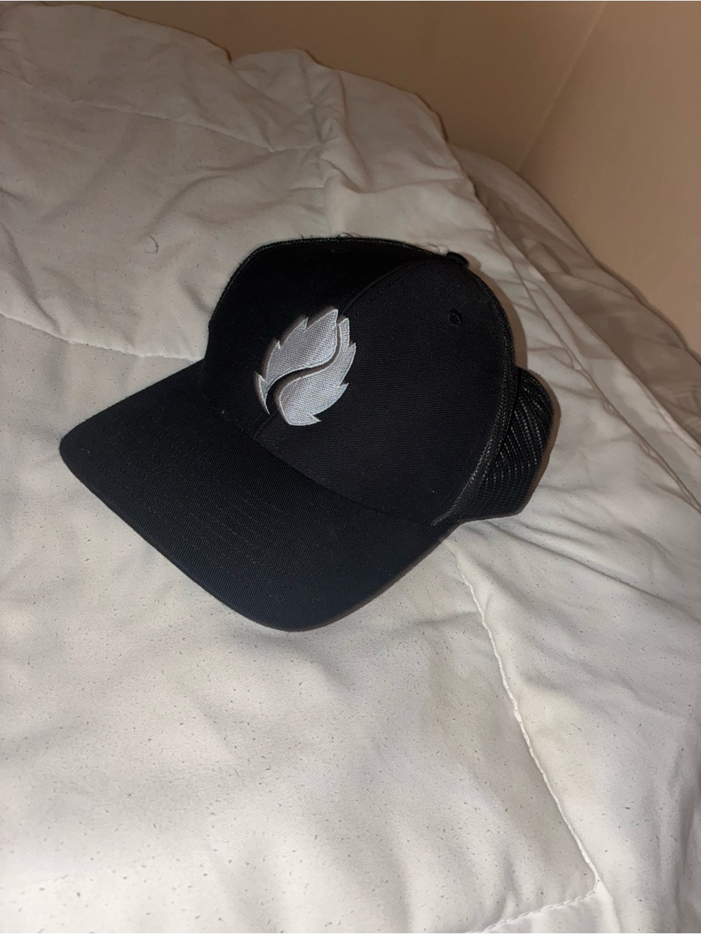 Black Mesh Back Trucker Cap with Silver Leaf Logo